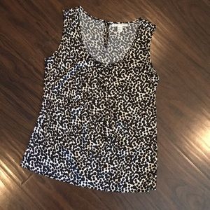 Sleeveless silk shell with dot print.